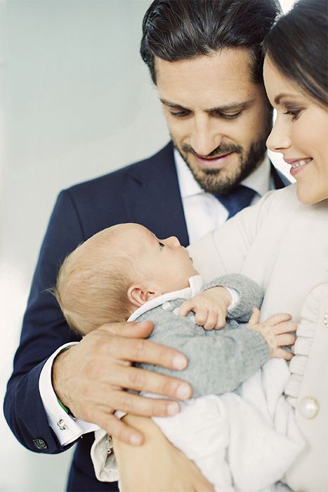 princess sofia of sweden and prince carl philip pose with baby gabriel
