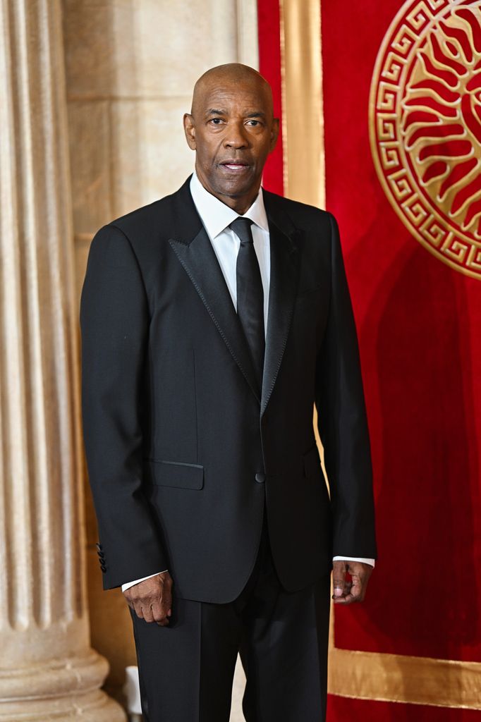 Denzel Washington in a black suit