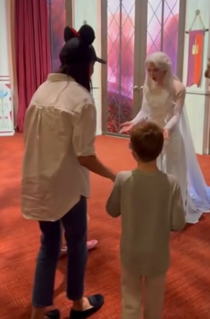 Meghan Markle and Prince Archie meeting an entertainer dressed as Elsa from Frozen