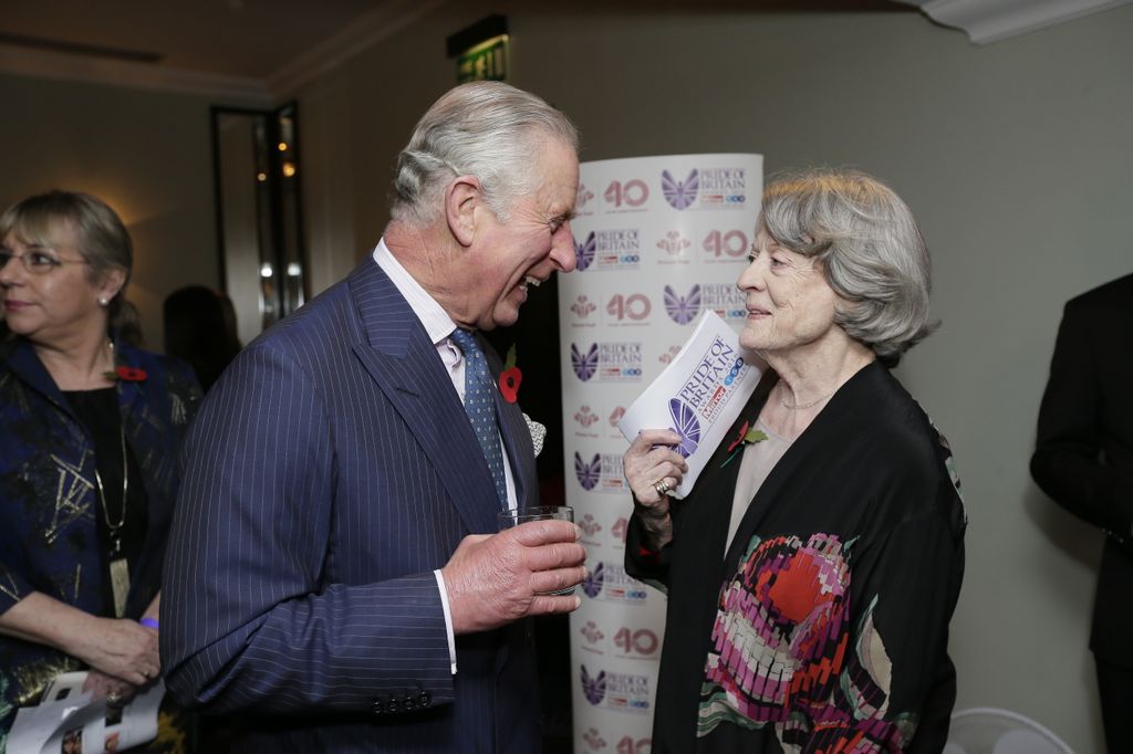 The then-Prince Charles speaks with Maggie Smith at the Pride Of Britain awards at the Grosvenor House Hotel on October 31, 2016 in London