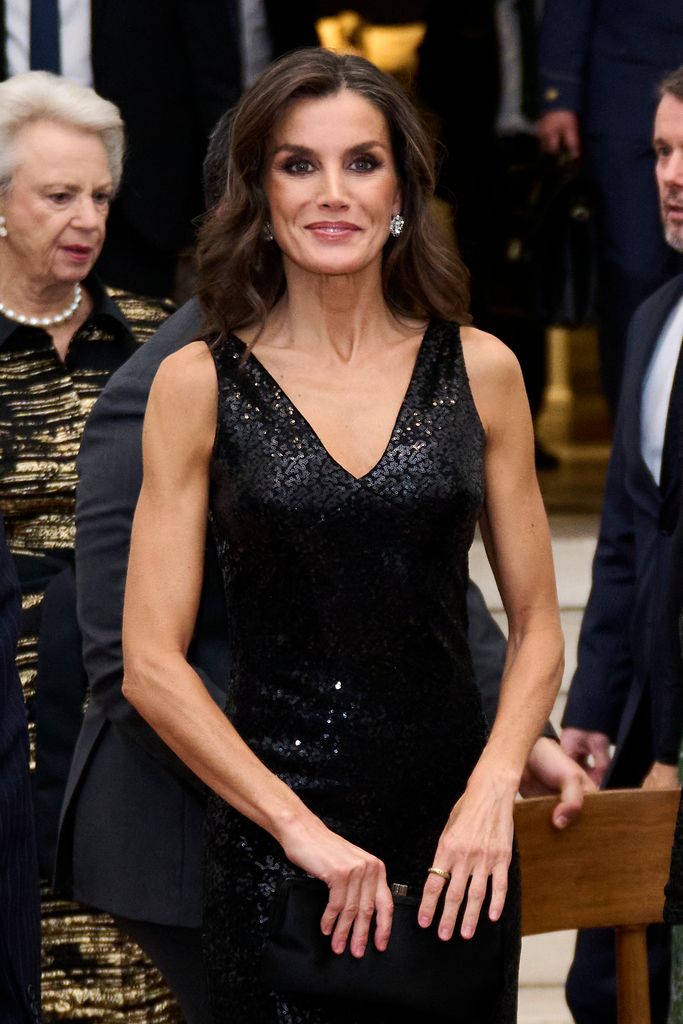 Queen Letizia often ops for sleeveless dress which perfectly show off her muscles