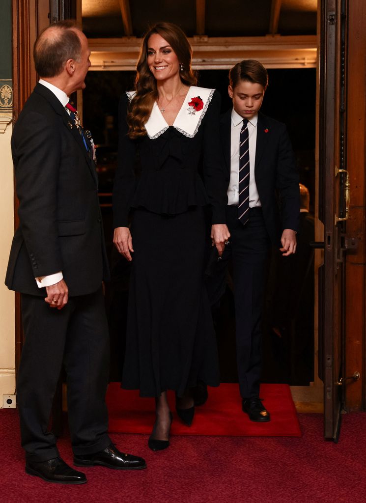 Kate Middleton walking with Prince George