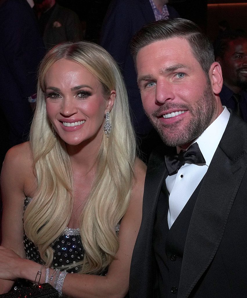 carrie underwood with mike fisher at grammys 2022