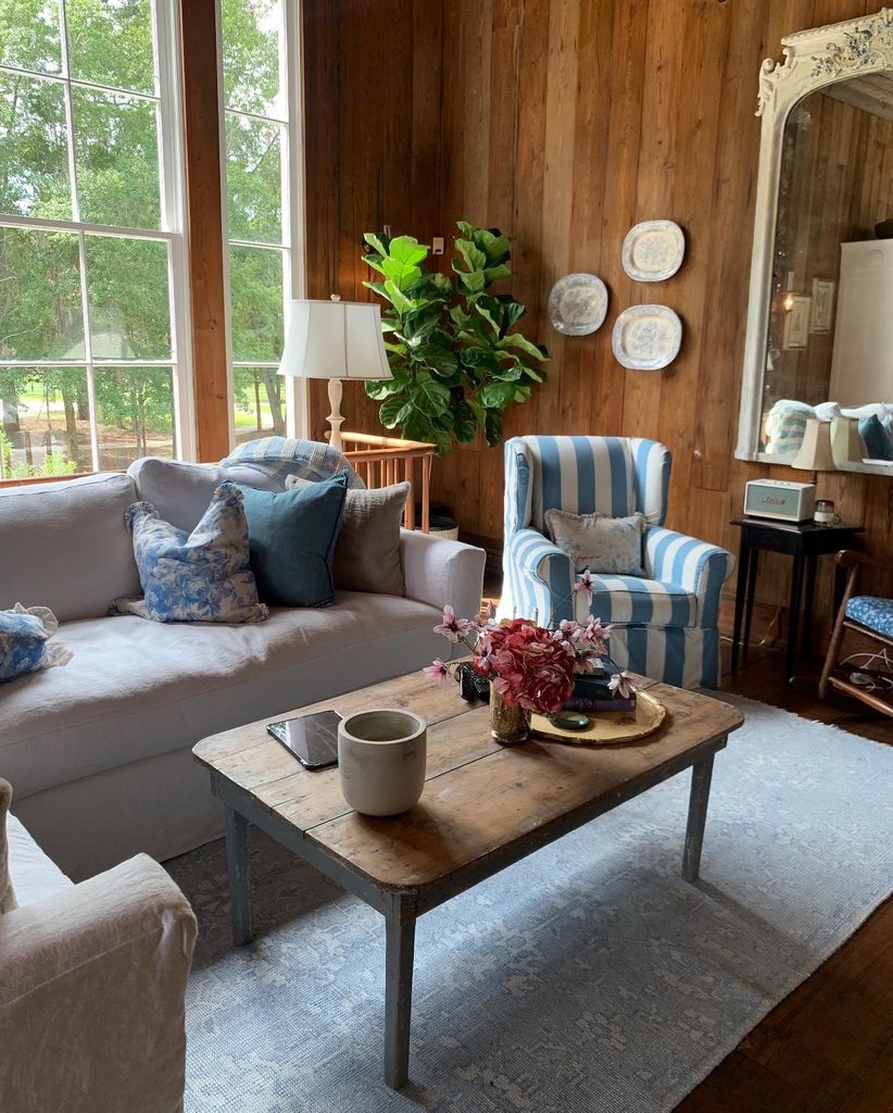 wood walled living room 