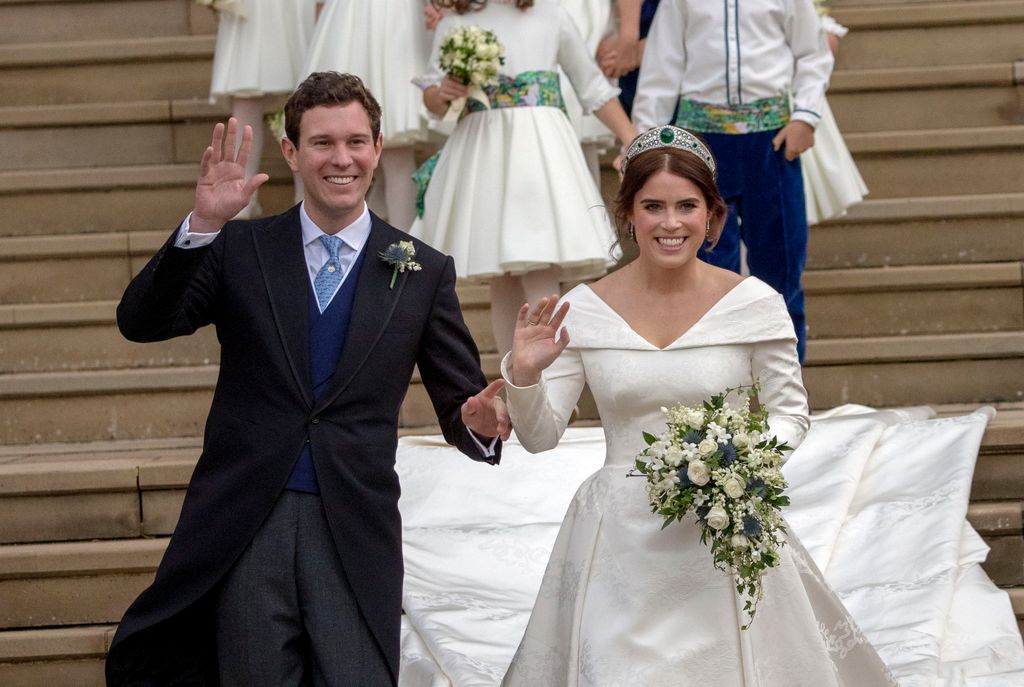 Princess Eugenie and Jack Brooksbank leave St George's Chapel in Windsor Castle following their wedding on October 12, 2018 in Windsor, England