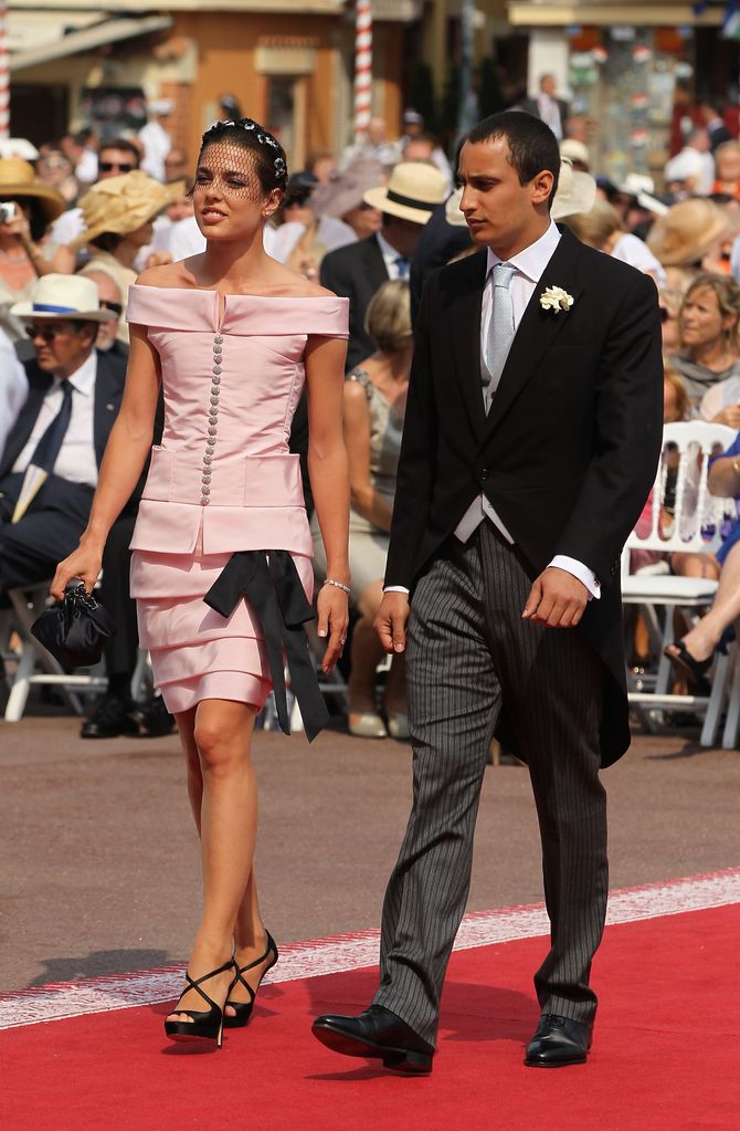 Charlotte Casiraghi and Alex Dellal attend the religious ceremony of the Royal Wedding of Prince Albert II of Monaco to Princess Charlene of Monaco in the main courtyard at the Prince's Palace on July 2, 2011 in Monaco. The Roman-Catholic ceremony follows the civil wedding which was held in the Throne Room of the Prince's Palace of Monaco on July 1. With her marriage to the head of state of the Principality of Monaco, Charlene Wittstock has become Princess consort of Monaco and gains the title, Princess Charlene of Monaco. Celebrations including concerts and firework displays are being held across several days, attended by a guest list of global celebrities and heads of state.  (Photo by Sean Gallup/Getty Images)