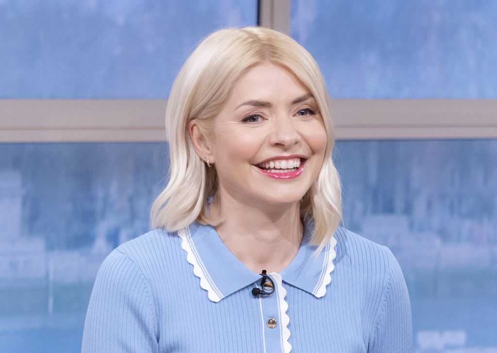 Holly Willoughby smiles as she hosts This Morning