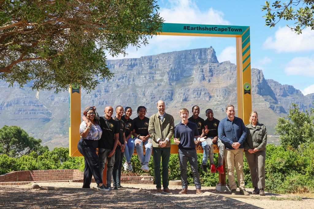 Prince William posed with the group in front of Table Mountain