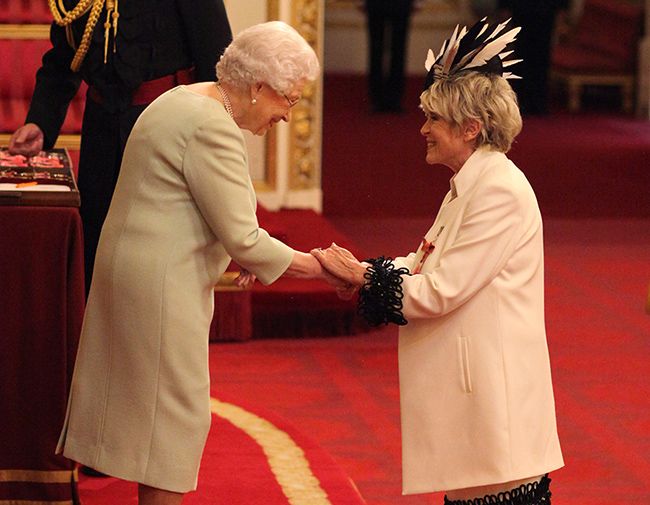 gloria hunniford receives obe from the queen at buckingham palace