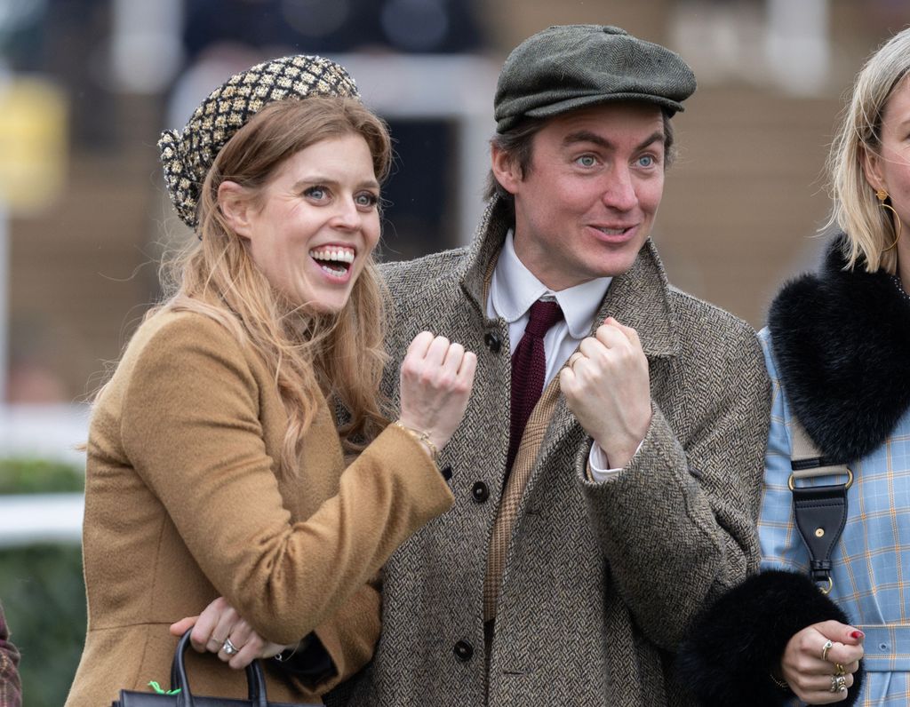 Princess Beatrice and Edoardo Mapelli Mozzi holding their fists up