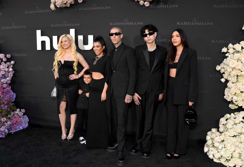 Alabama Barker, Reign Disick, Kourtney Kardashian, Travis Barker, Landon Barker and Atiana De La Hoya attend the Los Angeles premiere of Hulu's new show "The Kardashians" 