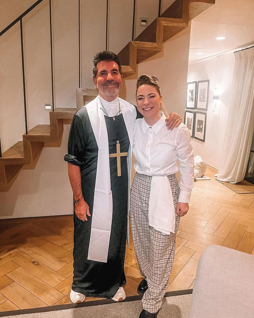 Simon Cowell in a priest outfit with Lucy Spraggan