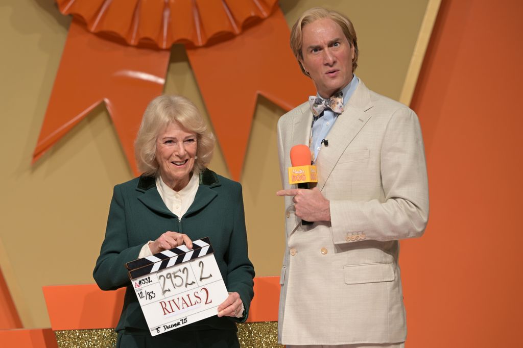 Queen Camilla with actor Oliver Chris on the film set of TV Show 'Rivals' 