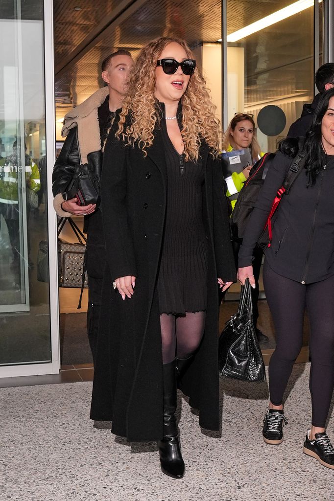Mariah Carey is seen arriving at the airport ahead of the Milano-Cortina Olympic games where she is set to perform at the opening ceremony on February 02, 2026 in Milan, Italy