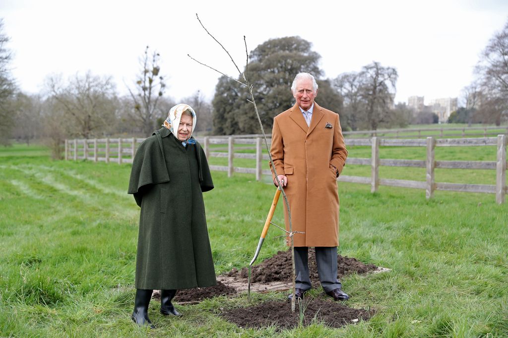 The Queen wears a dark green coat as she joins King Charles in a beige coat