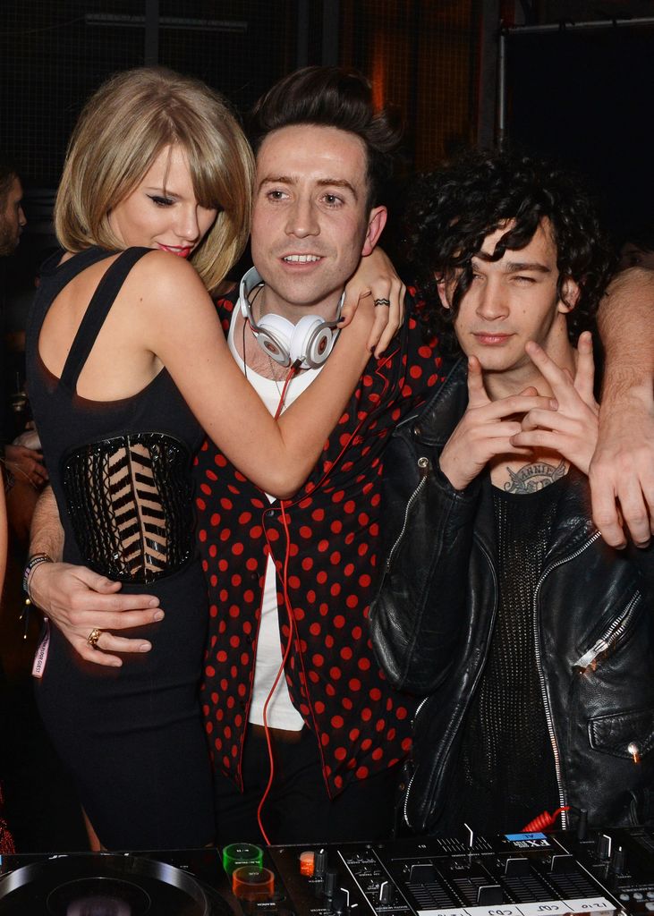 Taylor Swift, Nick Grimshaw and Matt Healy attend the Universal Music Brits party hosted by Bacardi at The Soho House Pop-Up on February 25, 2015 in London, England