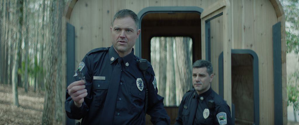 Dylan Taylor as Officer Lutz, Hamish Allan-Headley as Officer Wagner in the new Netflix series