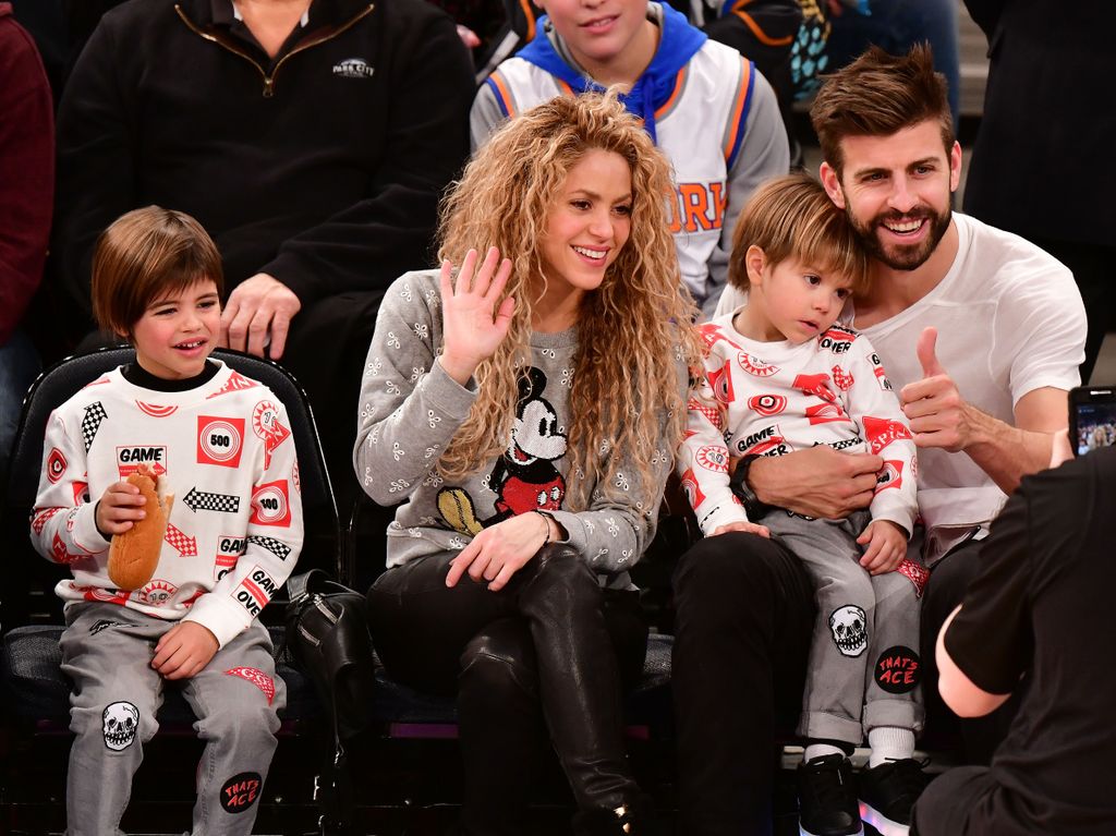 Milan Pique Mebarak, Shakira, Sasha Pique Mebarak and Gerard Pique attend the New York Knicks Vs Philadelphia 76ers game at Madison Square Garden on December 25, 2017 in New York City
