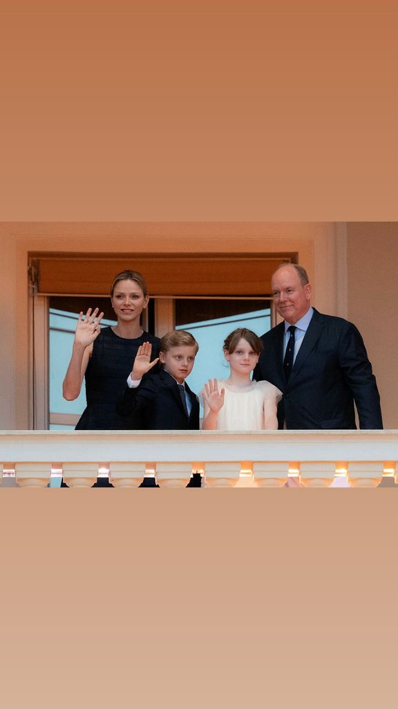 charlene, albert and twin children on balcony