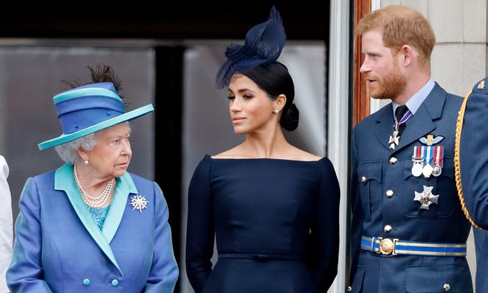 The Queen pictured with Meghan Markle and Prince Harry on Buckingham Palace balcony
