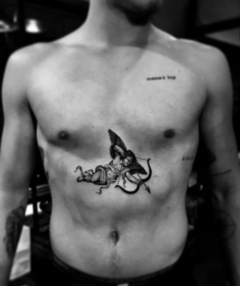 Brooklyn Beckham chest tattoo of Cupid unveiled