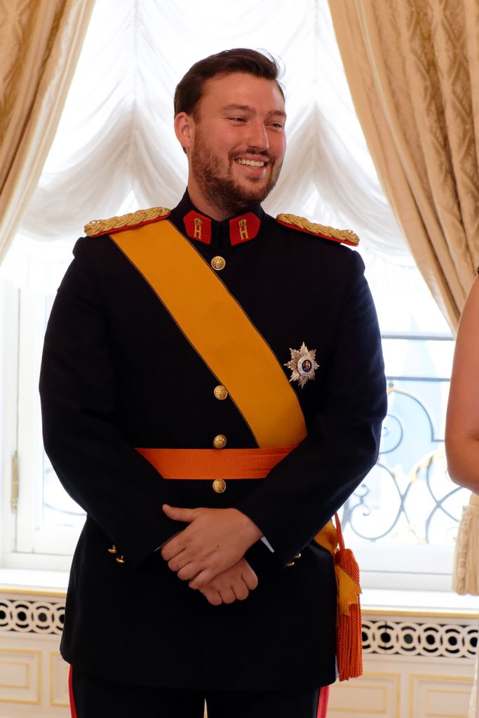 Prince Sebastien at reception in military gear 