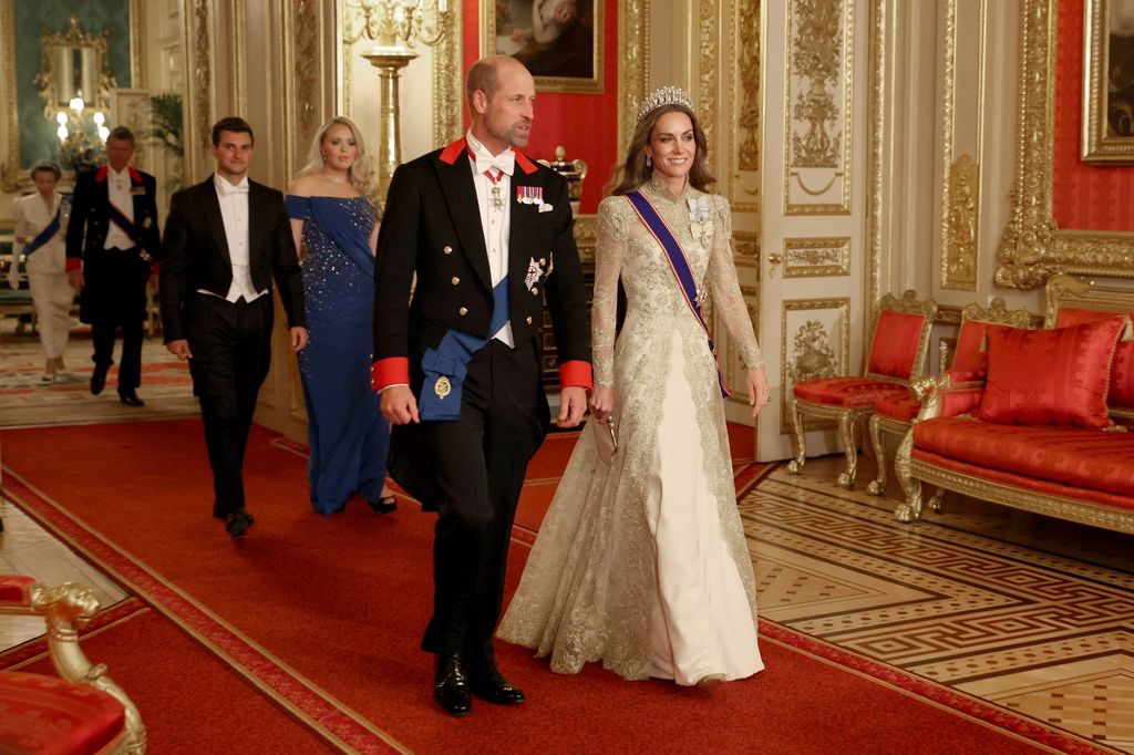 The Prince and Princess of Wales walk to attend the State Banquet at Windsor Castle 
