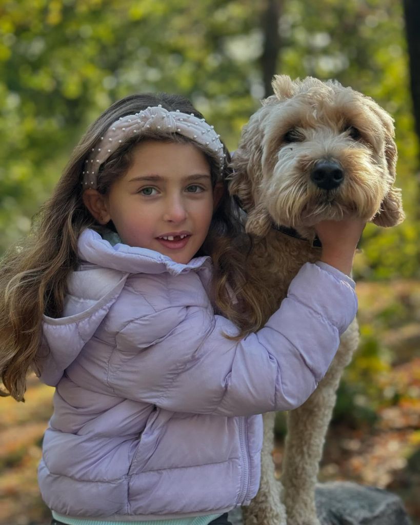 Princess Adrienne in the fall of 2024 with dog Teddy