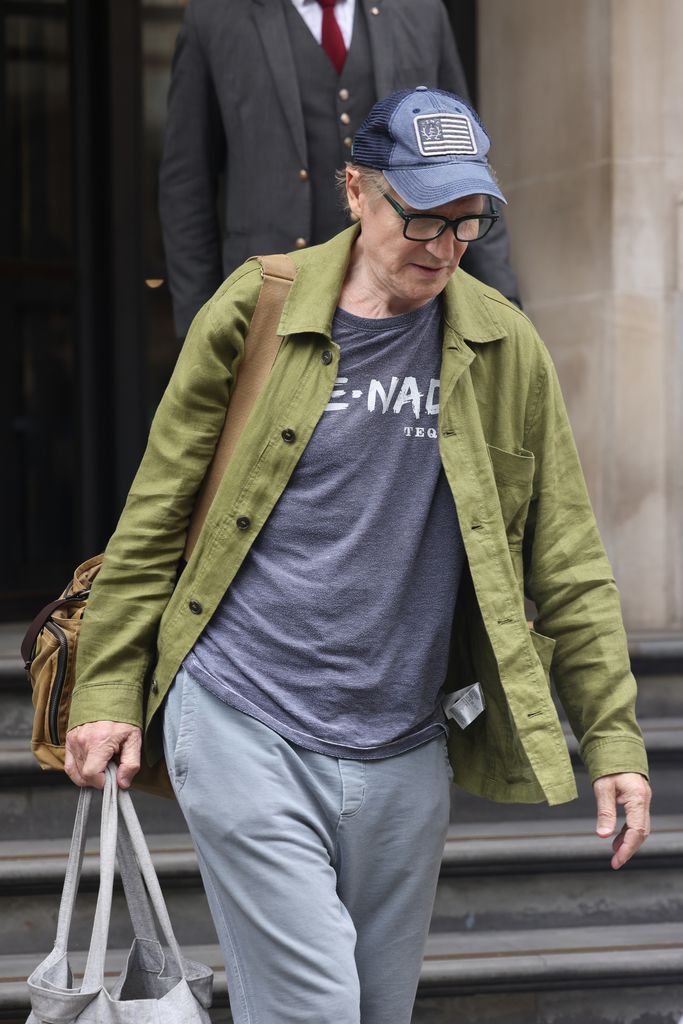 Liam Neeson leaving the Corinthia Hotel 