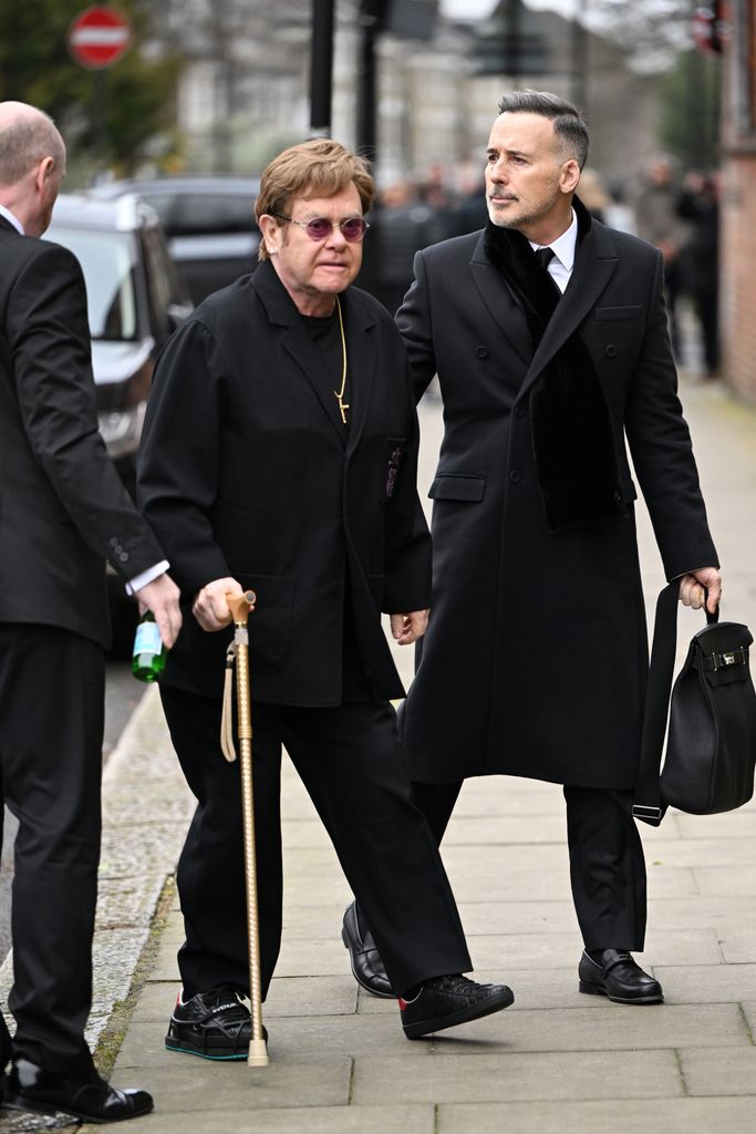 Elton John arrived alongside husband David Furnish