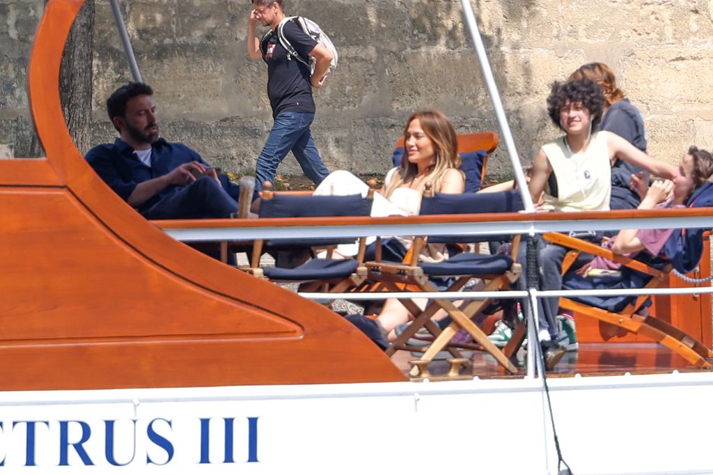 Jennifer Lopez and Ben Affleck take a cruise on the River Seine along with some of their children, Seraphina Affleck and Emme Muniz 