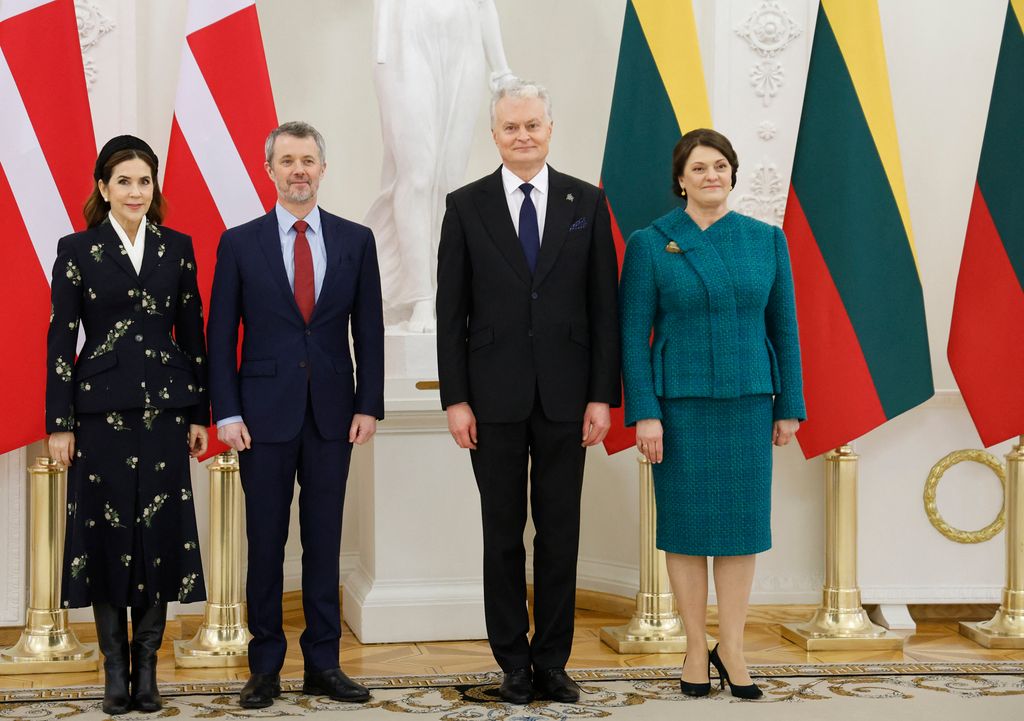 Lithuania's President Gitanas Nauseda (2nd R) and his wife, Lithuania's First Lady Diana Nausediene (R), pose for a photo with King Frederik X of Denmark (2nd L) and his wife, Queen Mary of Denmark in a line
