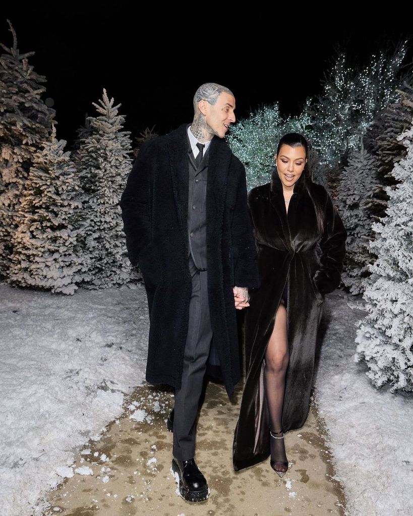 Kourtney and Travis pictured at the Kardashian's Christmas Eve party 