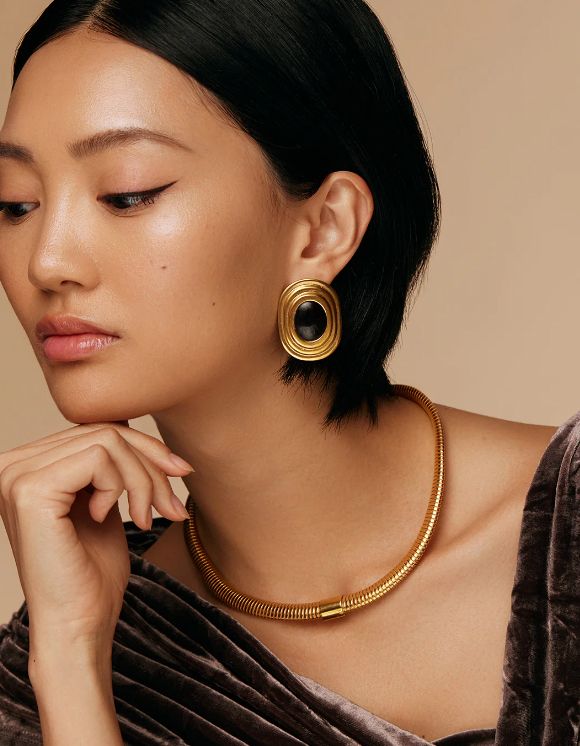 Statement earrings like these beauties from Soru will jazz up any simple dress