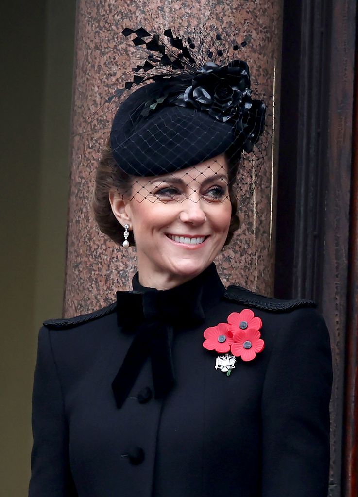 Catherine, Princess of Wales stands from the balcony during the National Service of Remembrance at The Cenotaph on November 10, 2024 in London, England. Each year members of the British Royal Family join politicians, veterans and members of the public to remember those who have died in combat. 