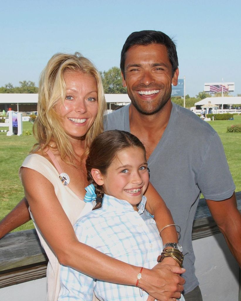 Mark Consuelos and Kelly Ripa in early 2010s with daughter Lola