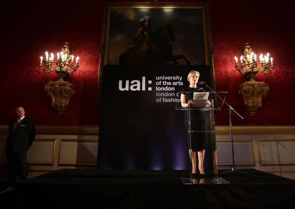 Sophie giving speech in dark palace room