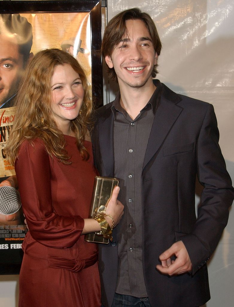 Drew Barrymore and actor Justin Long arrive at "Vince Vaughn's Wild West Comedy Show" Los Angeles premiere at the Egyptian Theatre on January 28, 2008 in Hollywood, California