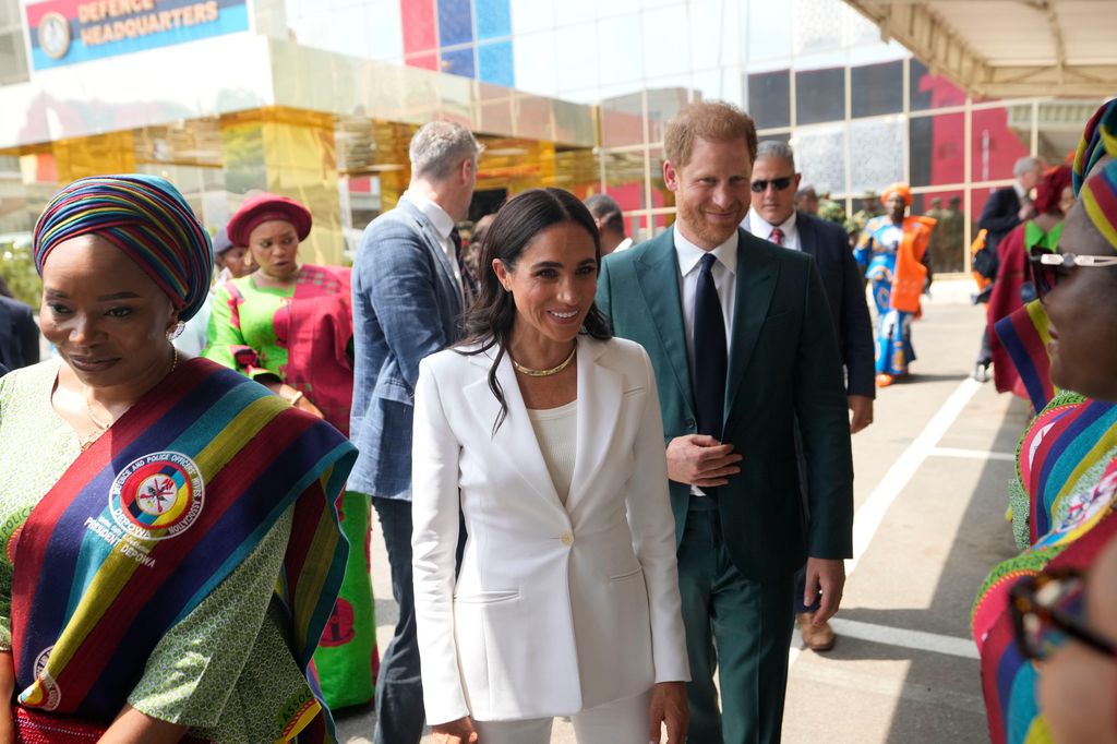 Meghan Markle wearing white suit at defence headquarters in Nigeria