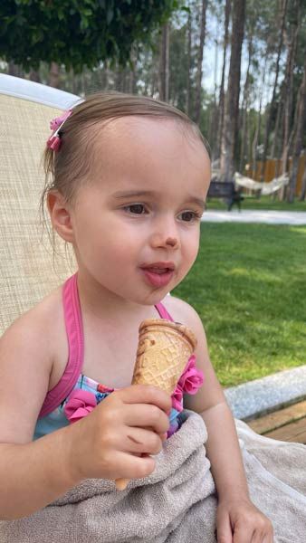 ella enjoying an ice cream on holiday