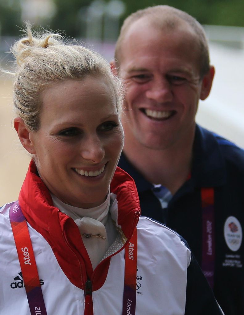 Great Britain's Zara Phillips with her husband Mike Tindall after they won silver in the Team Eventing Jumping Final on day four of the London Olympic Games at Greenwich Park, London.   (Photo by Andrew Milligan/PA Images via Getty Images)