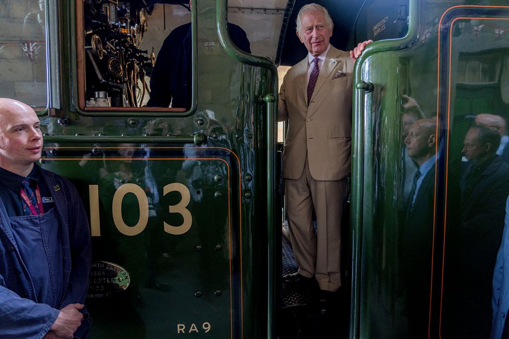 King Charles III arrives by train pulled by the Flying Scotsman into Pickering Station for a visit to the Railway and the town, in celebration of its 100th anniversary, on June 12, 2023 in Pickering, England.