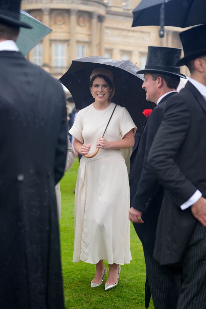 Princess Eugenie wearing white satin dress at garden party