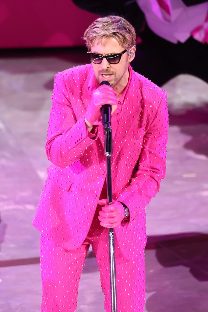 Ryan Gosling performing in hot pink from head-to-toe