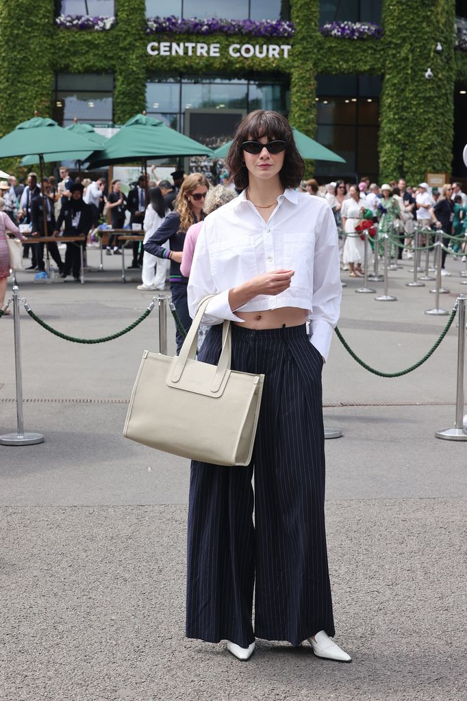 Emma Appleton arrives at All England Lawn Tennis and Croquet Club on July 06, 2025 in London, England