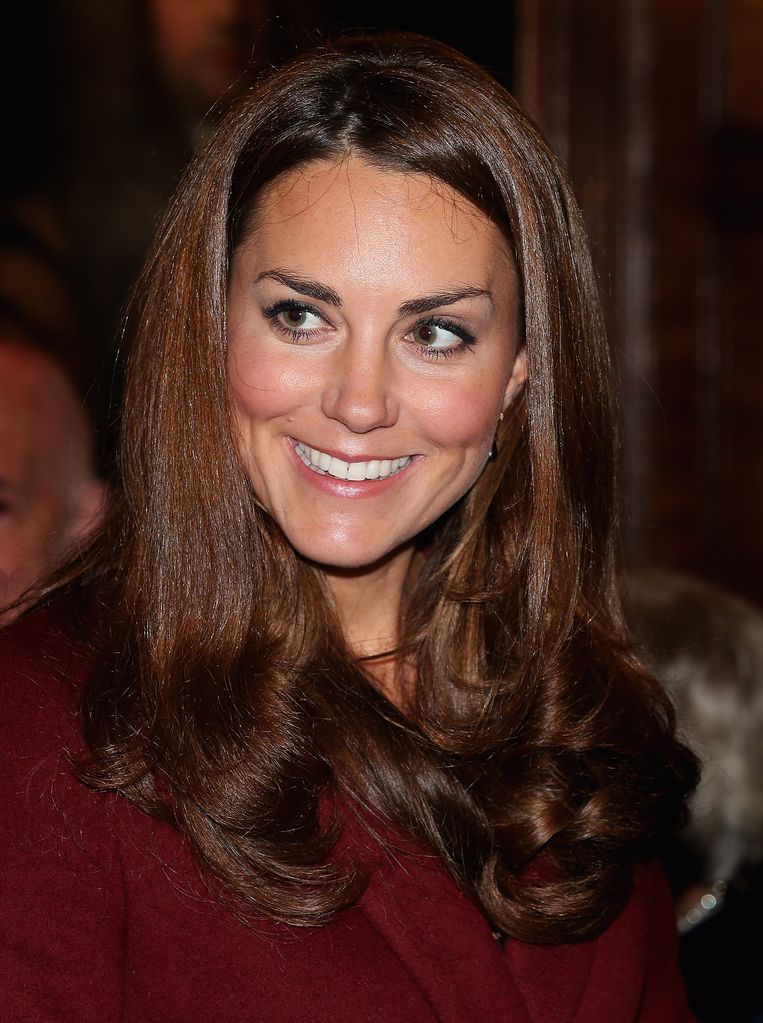 Kate Middleton laughs as she visits Middle Temple on October 8, 2012 in London, England. 