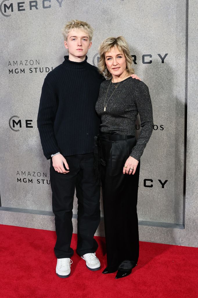 Amy's son towered over her during the carpet