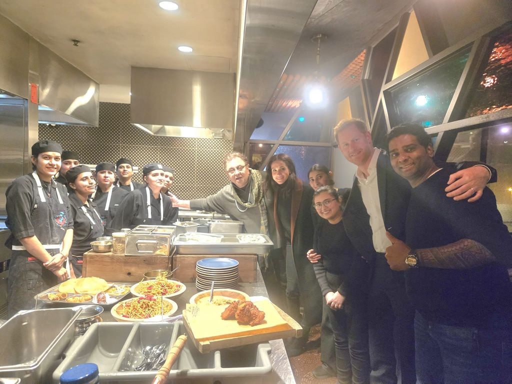 Prince Harry and Meghan Markle with Vij's restaurant staff