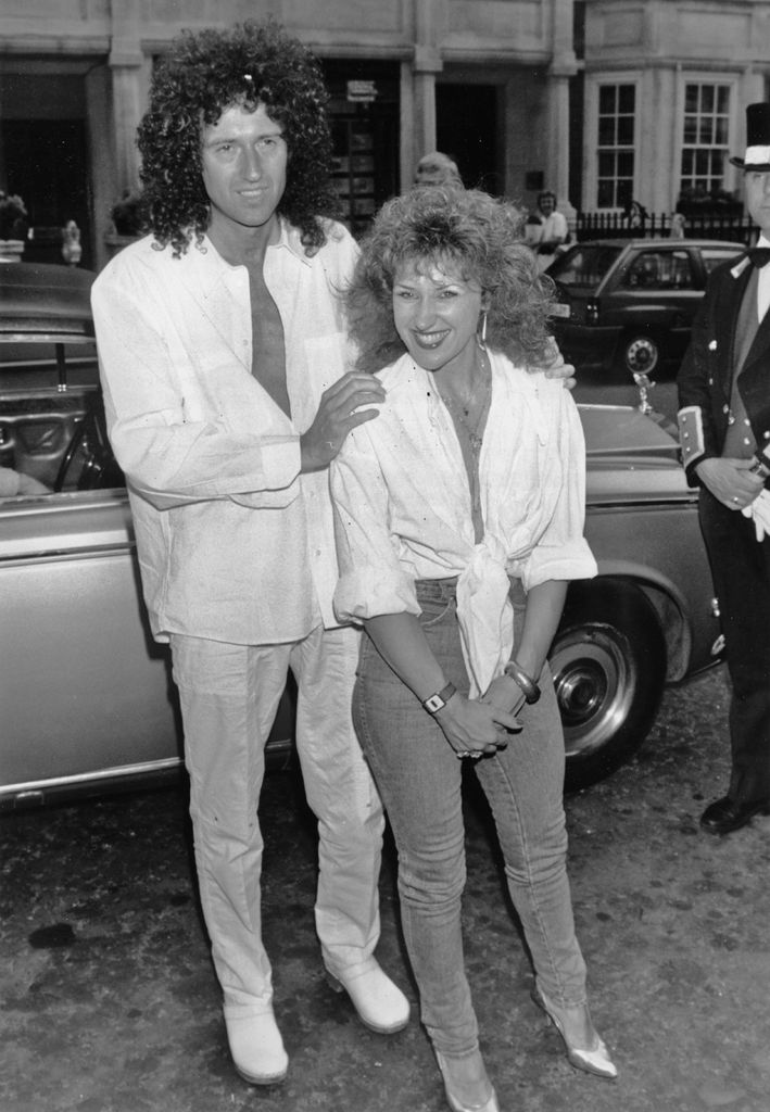 Black-and-white photo of Brian May and Anita Dobson