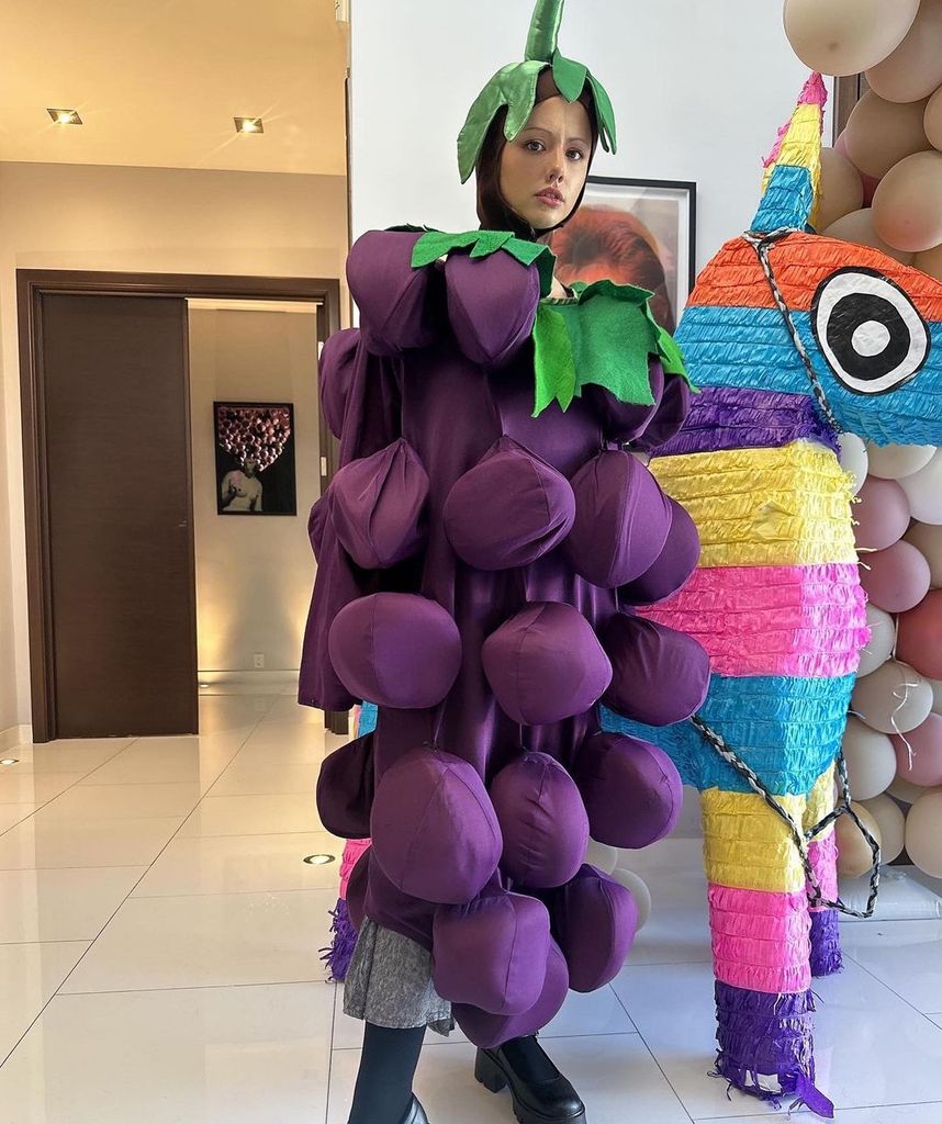 Lily Sheen dressed as grapes